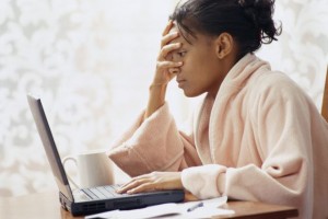Frustrated Woman Using Laptop