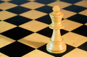 White Chess King on Chessboard